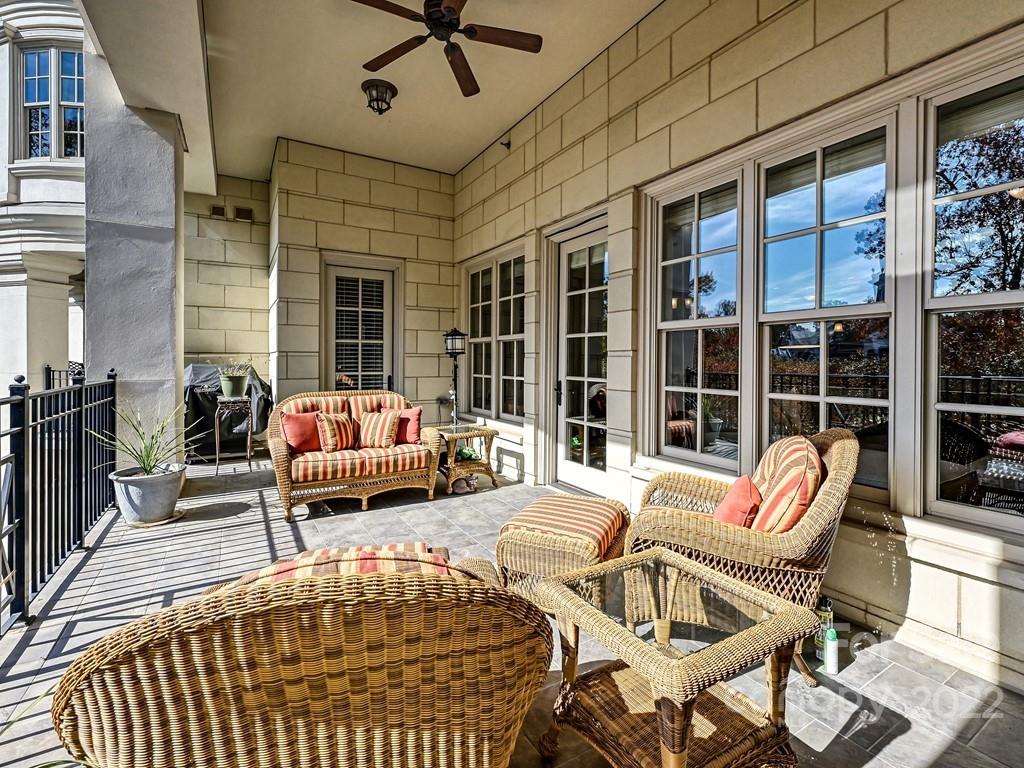2823 Providence Road, Unit 125 Charlotte, NC 28211 - Photo 17 of 30 a balcony with table and chairs