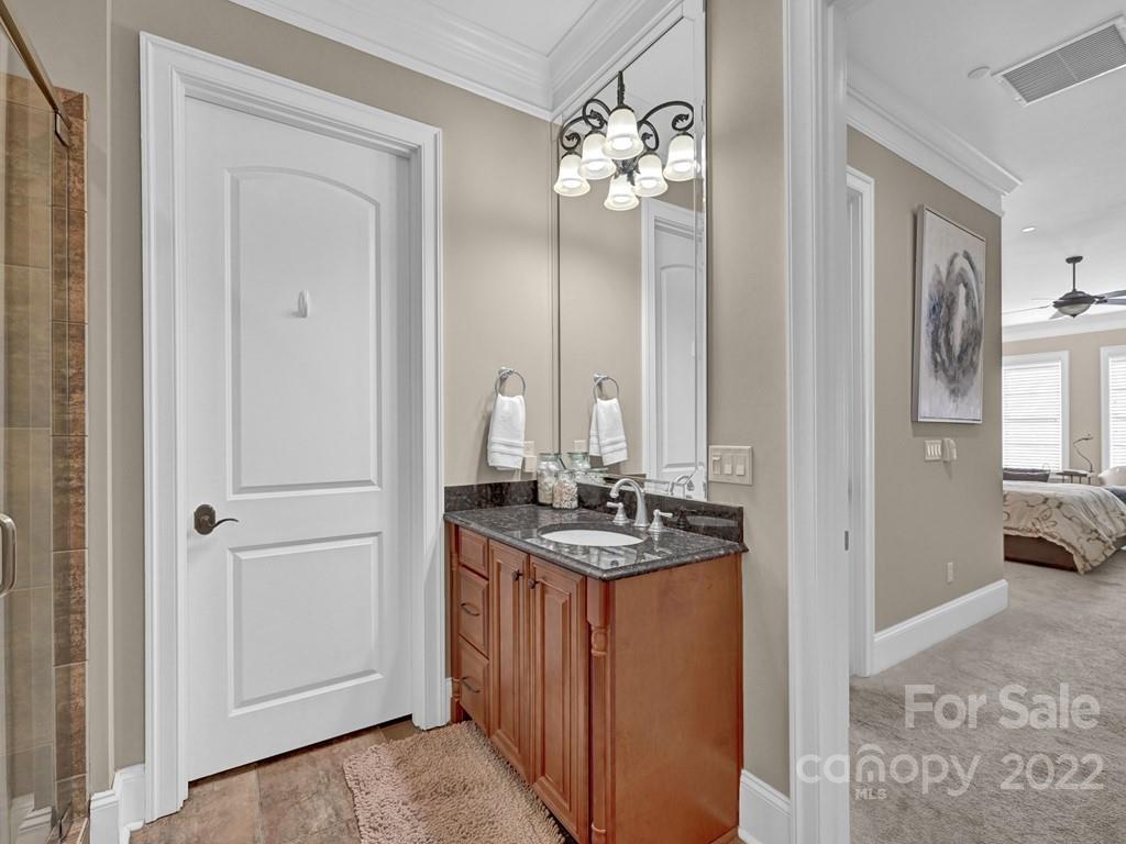 2823 Providence Road, Unit 125 Charlotte, NC 28211 - Photo 22 of 30 a view of a kitchen from the hallway