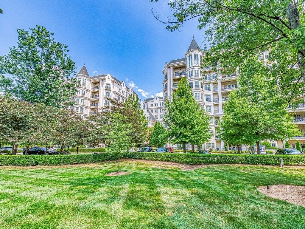 2823 Providence Road, Unit 125 Charlotte, NC 28211 - Photo 29 of 30 a view of a building with garden