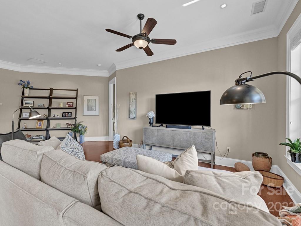 2823 Providence Road, Unit 125 Charlotte, NC 28211 - Photo 4 of 30 a living room with furniture and a flat screen tv