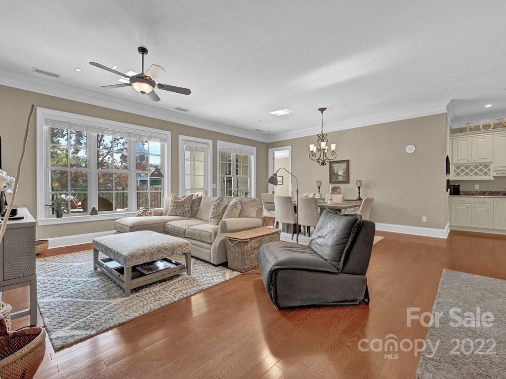 2823 Providence Road, Unit 125 Charlotte, NC 28211 - Photo 5 of 30 a living room with furniture and a large window