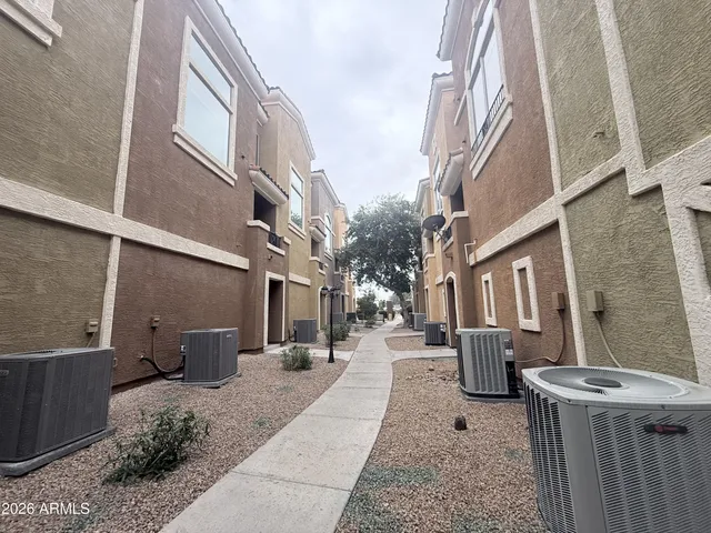 a view of a pathway along a building