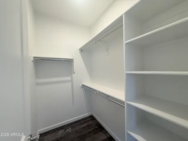 a view of an empty walk in closet