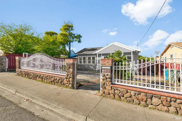 a front view of a house with a porch