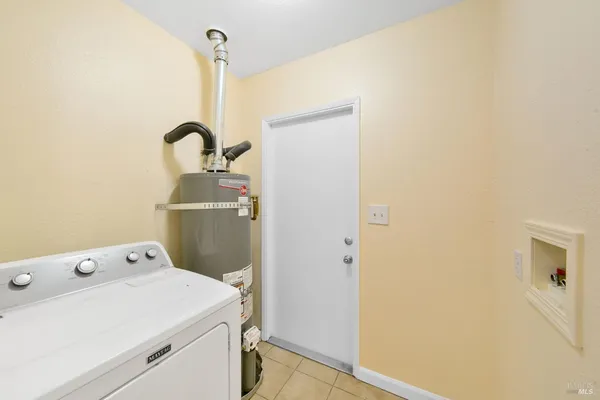 a bathroom with a sink and vanity