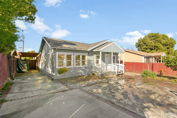 a view of a house with a patio