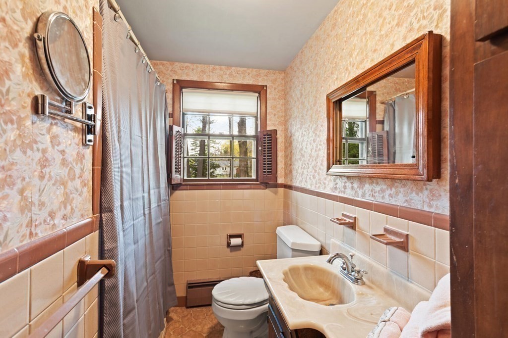 41 Ansie Road Chelmsford, MA 01824 - Photo 19 of 28 a bathroom with a sink and a toilet