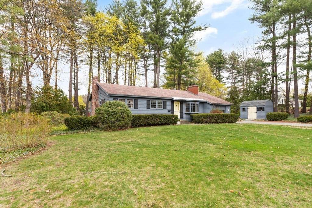 41 Ansie Road Chelmsford, MA 01824 - Photo 2 of 28 a front view of a house with a garden