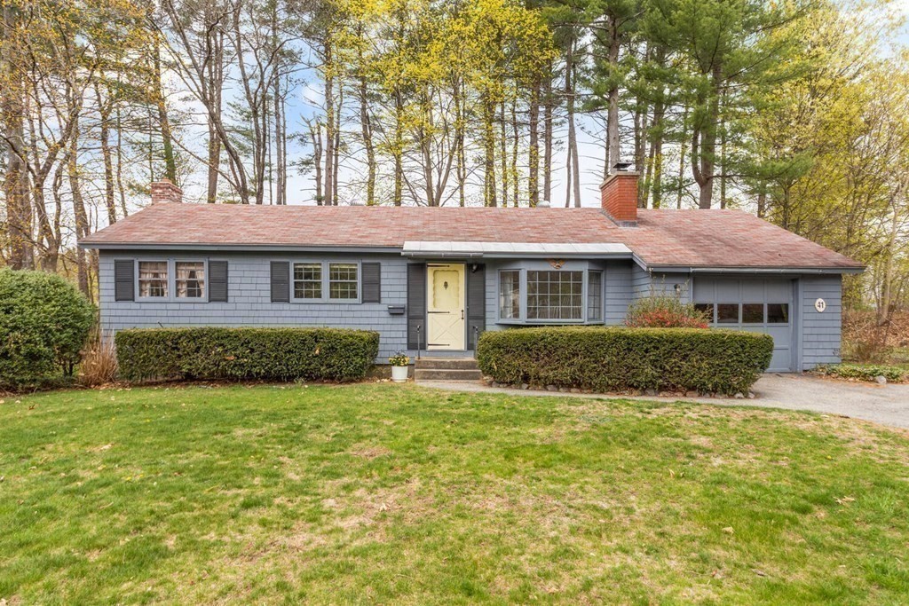 41 Ansie Road Chelmsford, MA 01824 - Photo 28 of 28 a view of a house with a yard and plants
