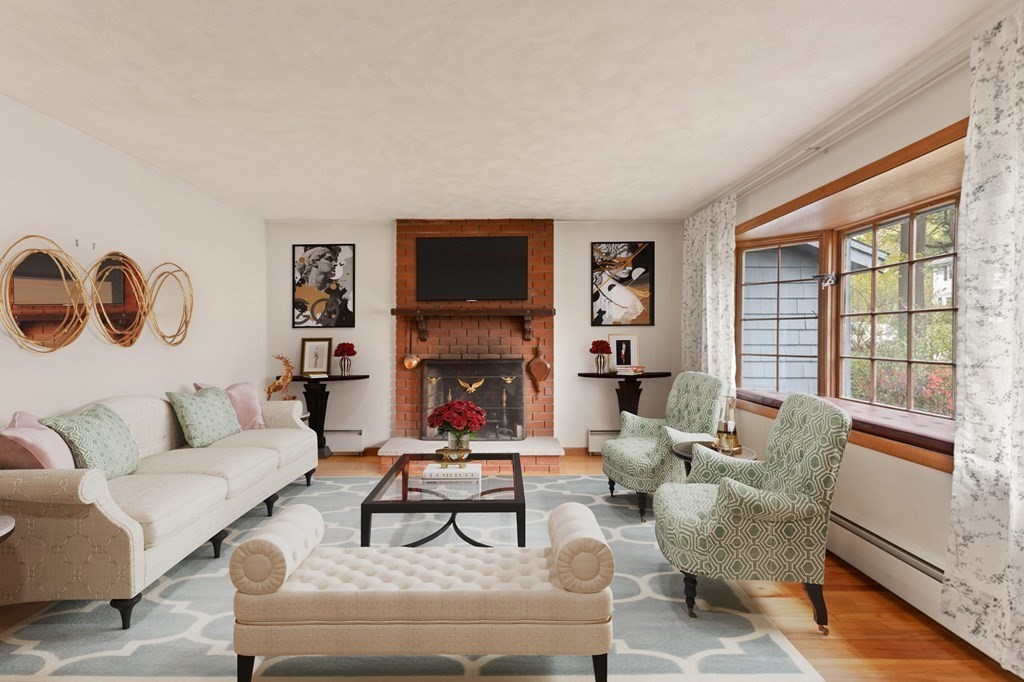 41 Ansie Road Chelmsford, MA 01824 - Photo 4 of 28 a living room with furniture large window and a flat screen tv