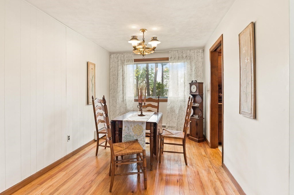 41 Ansie Road Chelmsford, MA 01824 - Photo 6 of 28 a view of a dining room with furniture window and wooden floor