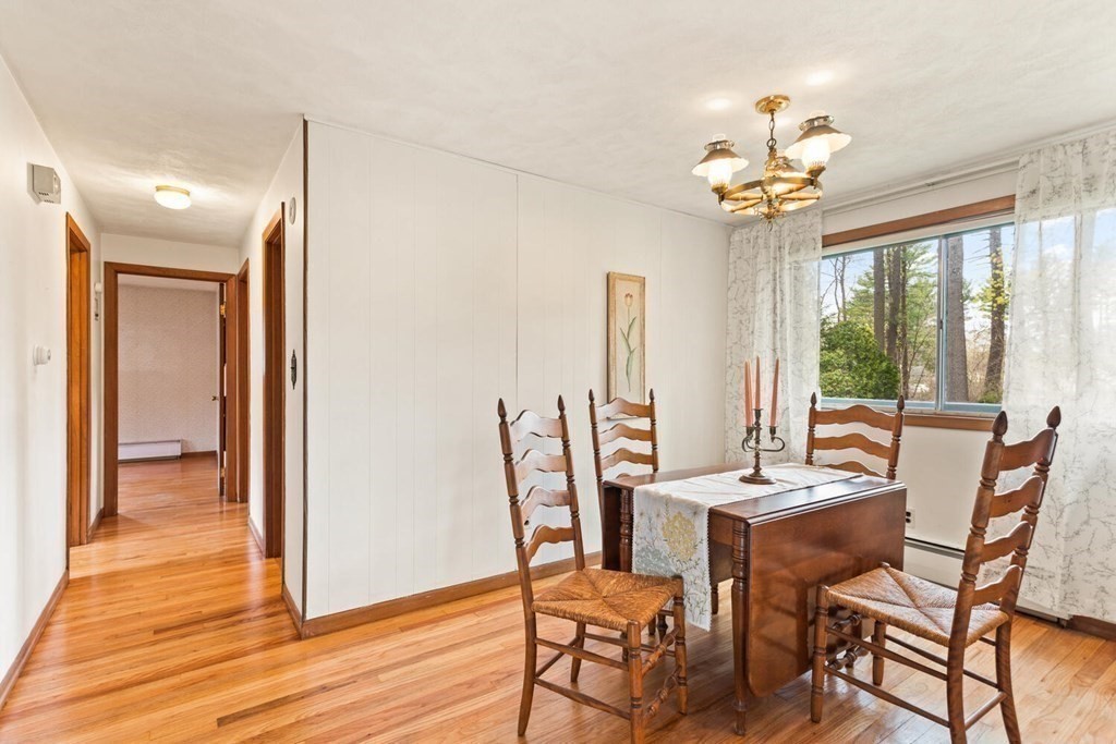 41 Ansie Road Chelmsford, MA 01824 - Photo 7 of 28 a view of a dining room with furniture window and outside view