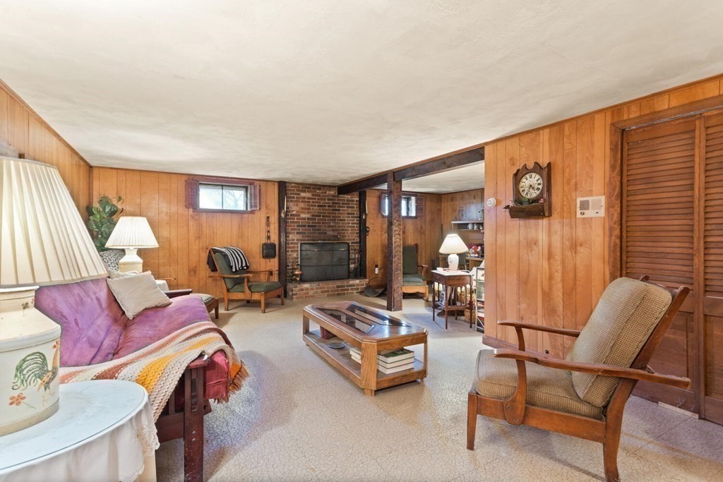 41 Ansie Road Chelmsford, MA 01824 - Photo 8 of 28 a living room with furniture and a large window