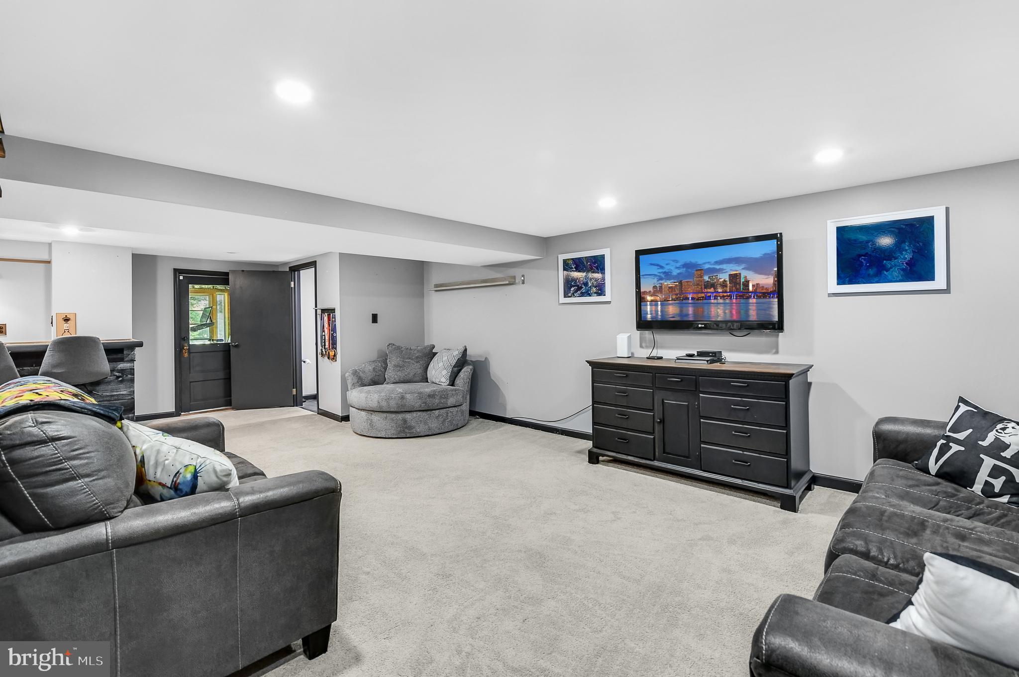 3226 State Hill Road Reading, PA 19608 - Photo 17 of 54 a living room with furniture and a flat screen tv