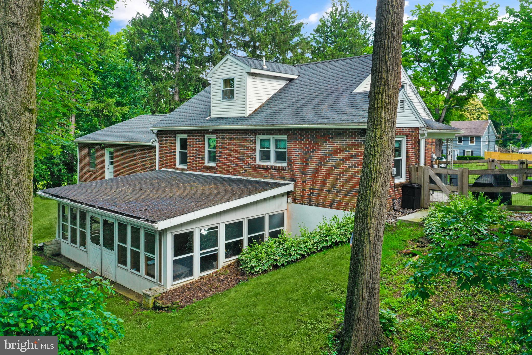 3226 State Hill Road Reading, PA 19608 - Photo 33 of 54 a view of a house with a yard and potted plants