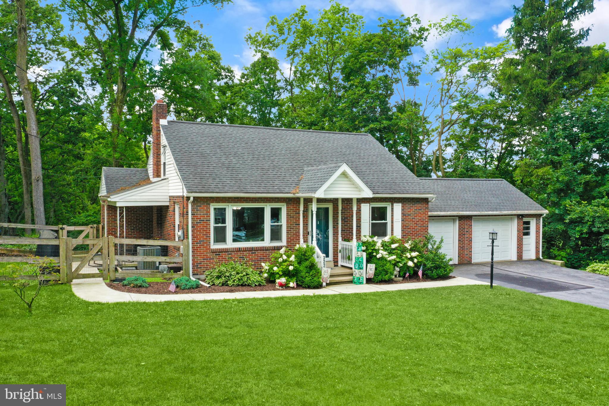 3226 State Hill Road Reading, PA 19608 - Photo 36 of 54 a front view of a house with a garden