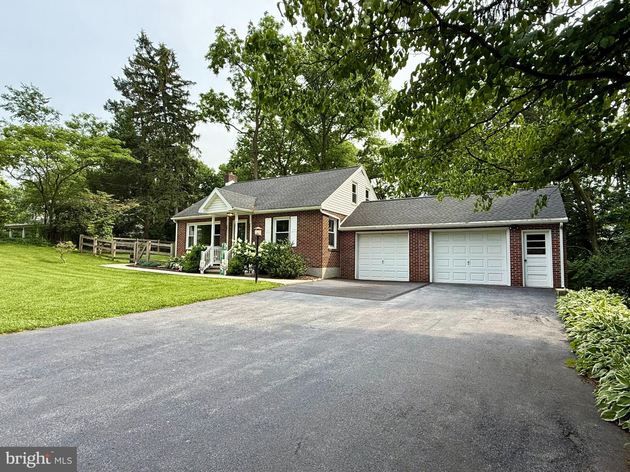 3226 State Hill Road Reading, PA 19608 - Photo 42 of 54 a front view of a house with yard and tree
