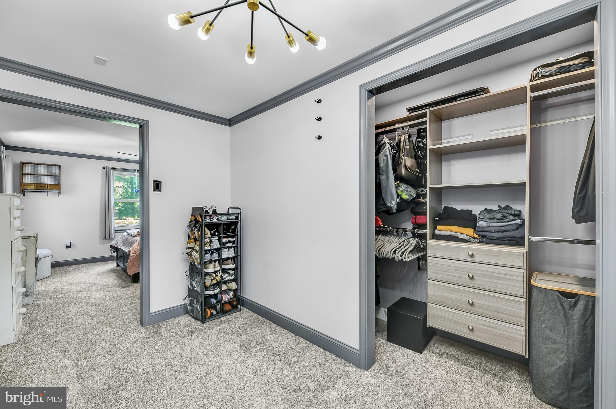 3226 State Hill Road Reading, PA 19608 - Photo 50 of 54 a view of walk in closet with clothes and shoes