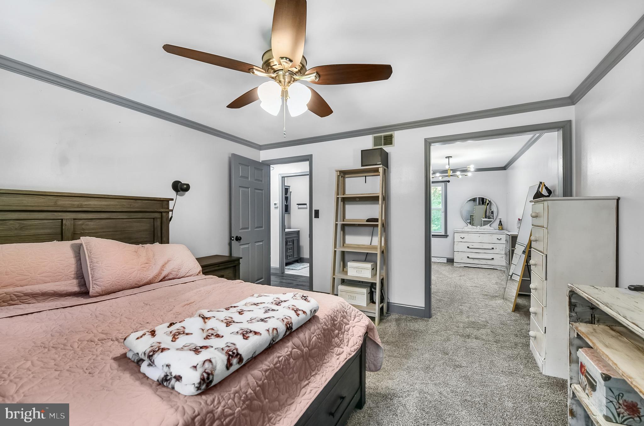 3226 State Hill Road Reading, PA 19608 - Photo 52 of 54 a bedroom with a large bed and ceiling fan
