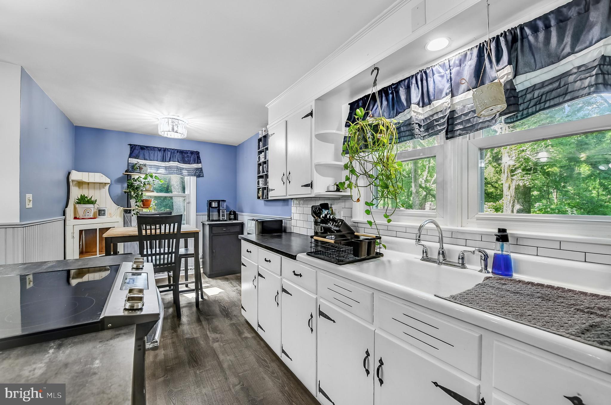 3226 State Hill Road Reading, PA 19608 - Photo 8 of 54 a kitchen with lots of counter top space and wooden floor