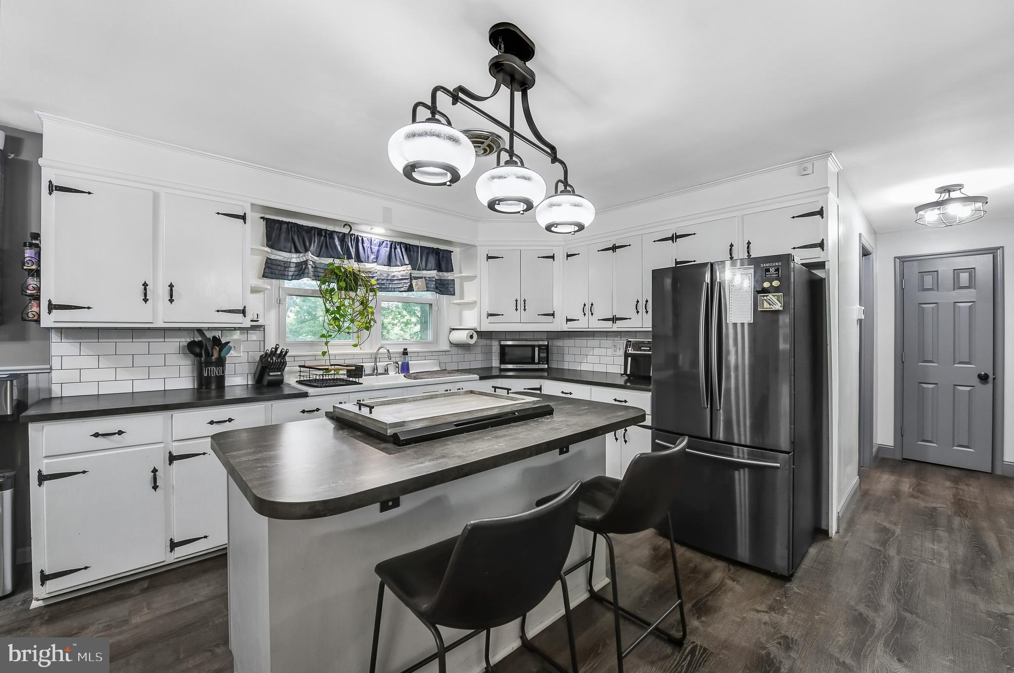 3226 State Hill Road Reading, PA 19608 - Photo 9 of 54 a kitchen with refrigerator cabinets and furniture