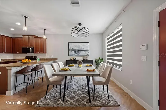 a view of a dining room with furniture