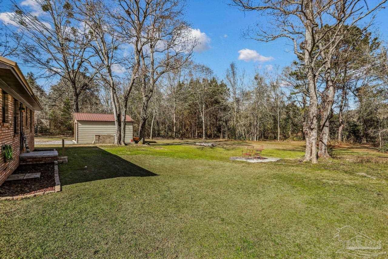 4010 Wyndham Road Century, FL 32535 - Photo 22 of 25 a view of outdoor space with garden