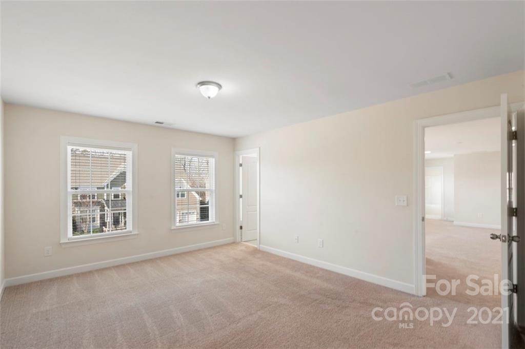 4331 Oxford Mill Road Waxhaw, NC 28173 - Photo 31 of 48 an empty room with windows and closet