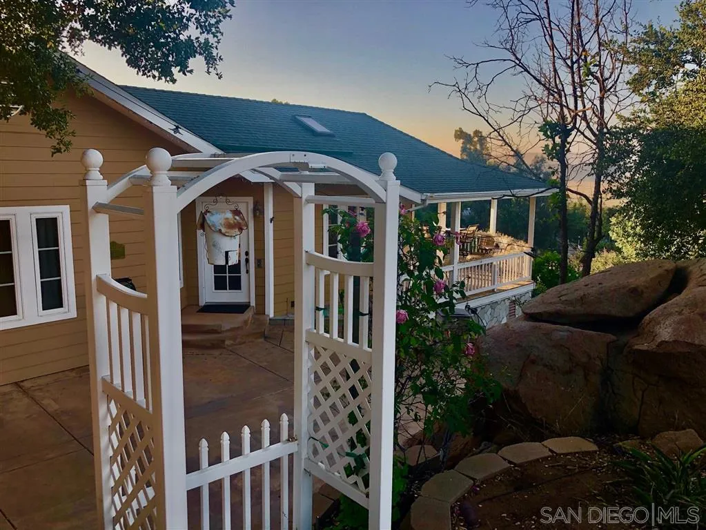 18259 Chablis Road Ramona, CA 92065 - Photo 14 of 24 a front view of a house with garden