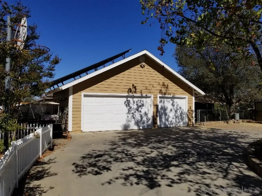 18259 Chablis Road Ramona, CA 92065 - Photo 20 of 24 a front view of house with yard
