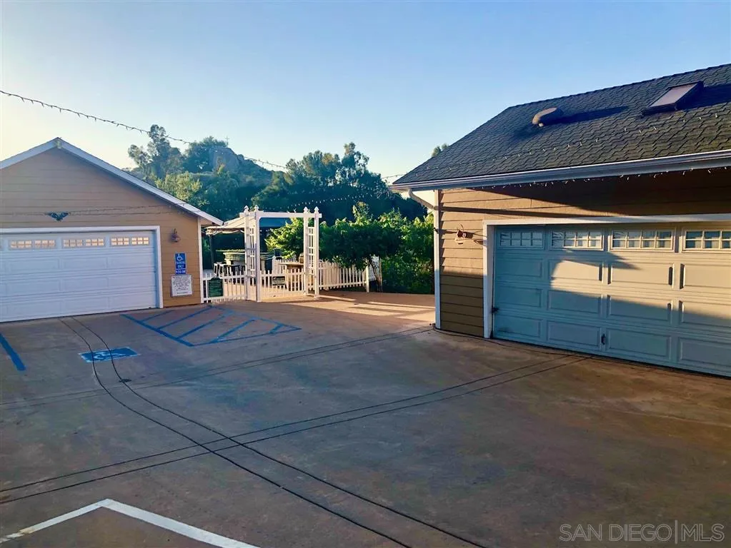 18259 Chablis Road Ramona, CA 92065 - Photo 21 of 24 a front view of a house with garden