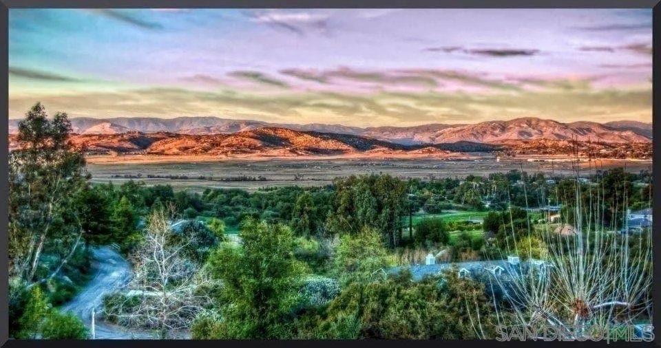 18259 Chablis Road Ramona, CA 92065 - Photo 22 of 24 a view of a city with sunset
