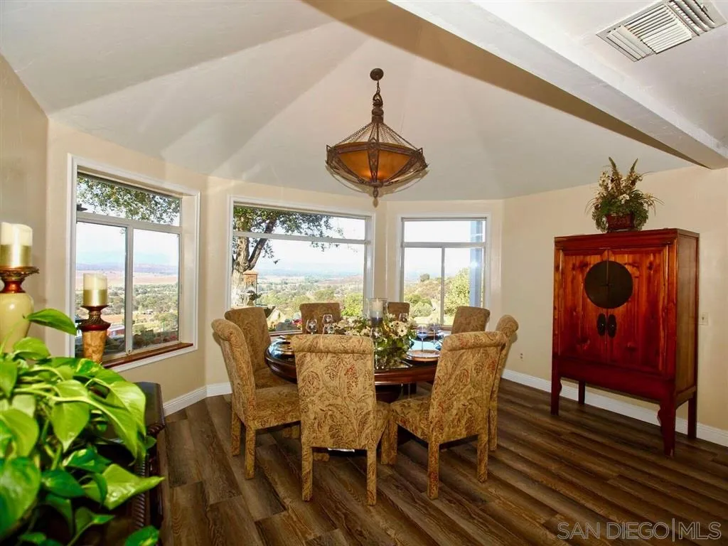 18259 Chablis Road Ramona, CA 92065 - Photo 7 of 24 a view of a dining room with furniture window and outside view