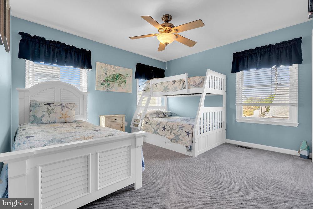 108 West 10th Street Ship Bottom, NJ 08008 - Photo 15 of 47 Bright and airy coastal-themed bedroom retreat.