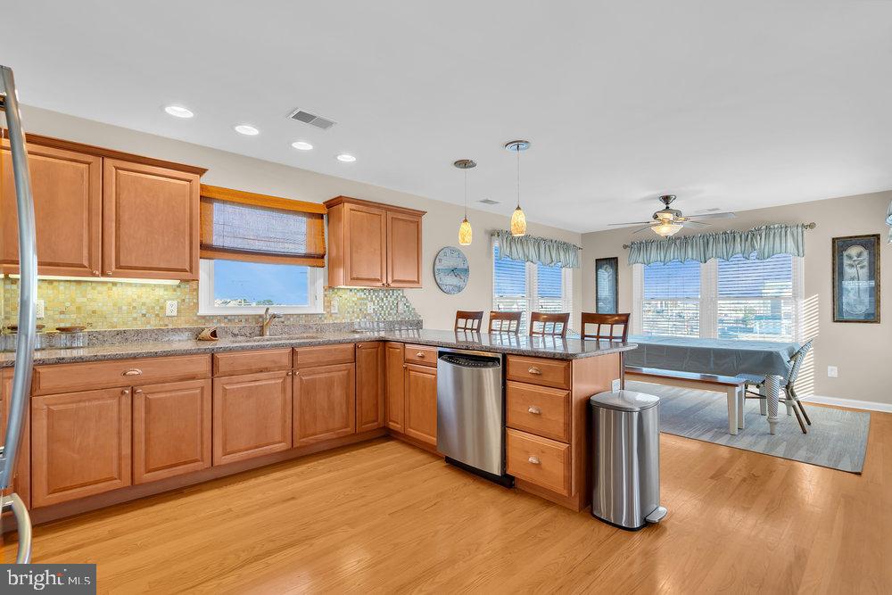 108 West 10th Street Ship Bottom, NJ 08008 - Photo 26 of 47 Modern kitchen with warm wood accents.