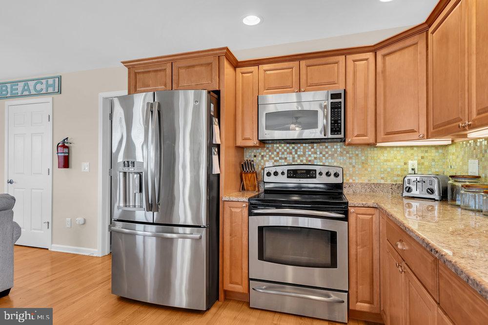 108 West 10th Street Ship Bottom, NJ 08008 - Photo 28 of 47 Modern kitchen with sleek appliances.
