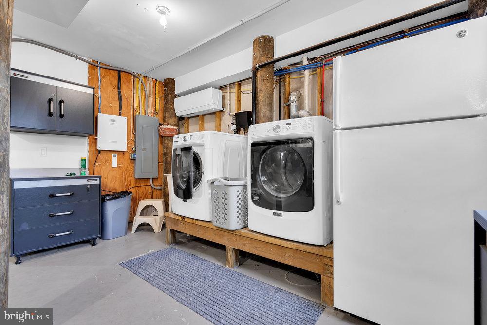 108 West 10th Street Ship Bottom, NJ 08008 - Photo 40 of 47 Functional laundry space with modern appliances.