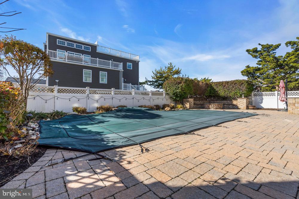 108 West 10th Street Ship Bottom, NJ 08008 - Photo 41 of 47 Serene outdoor space with pool cover.