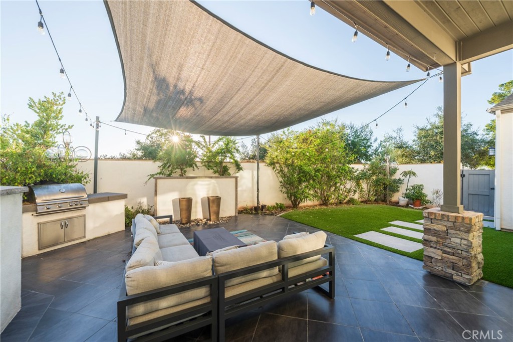 102 Spectacle Irvine, CA 92618 - Photo 15 of 40 a outdoor living space with furniture and garden view