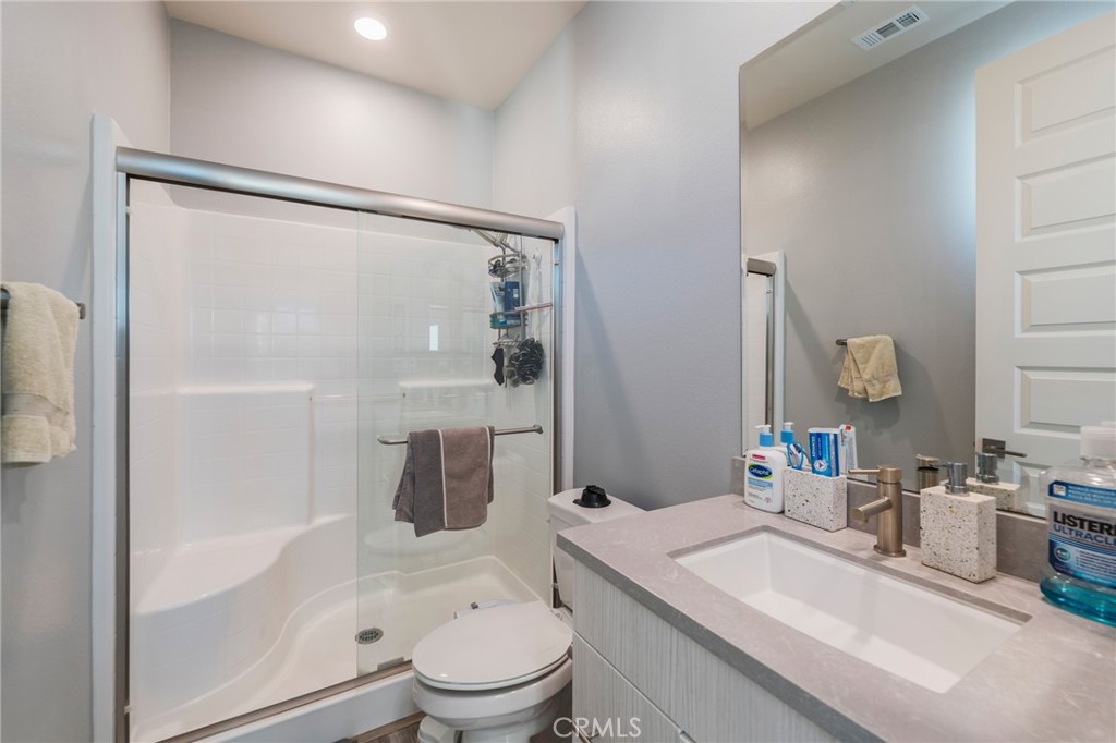 102 Spectacle Irvine, CA 92618 - Photo 32 of 40 a bathroom with a sink toilet and shower