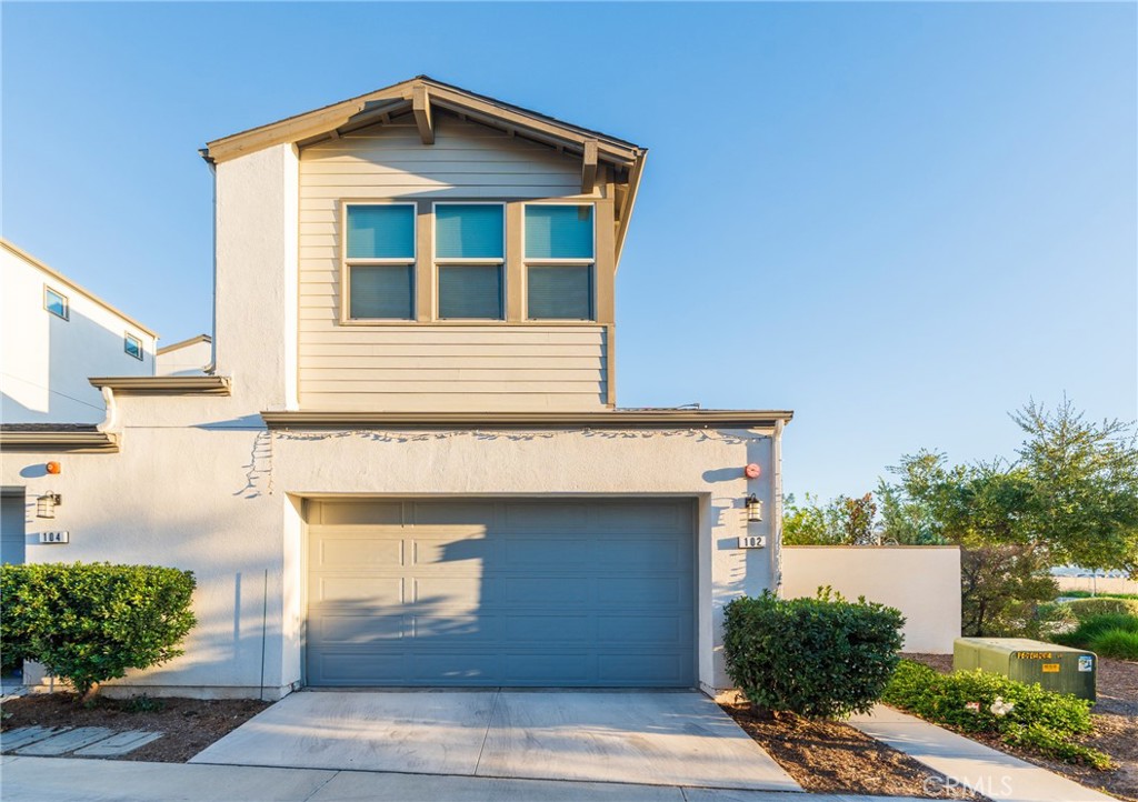 102 Spectacle Irvine, CA 92618 - Photo 33 of 40 a front view of a house with a yard