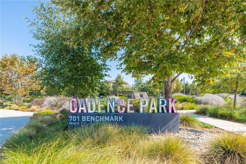 102 Spectacle Irvine, CA 92618 - Photo 35 of 40 a view of swimming pool with lawn chairs and plants