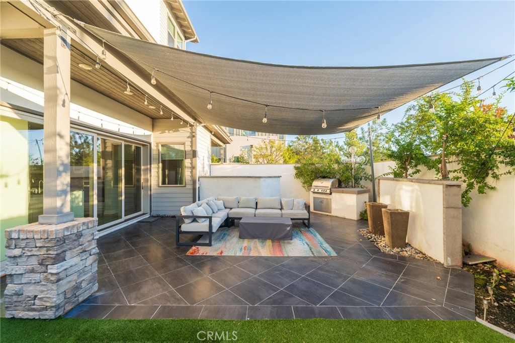 102 Spectacle Irvine, CA 92618 - Photo 4 of 40 a view of outdoor space yard deck patio and outdoor kitchen