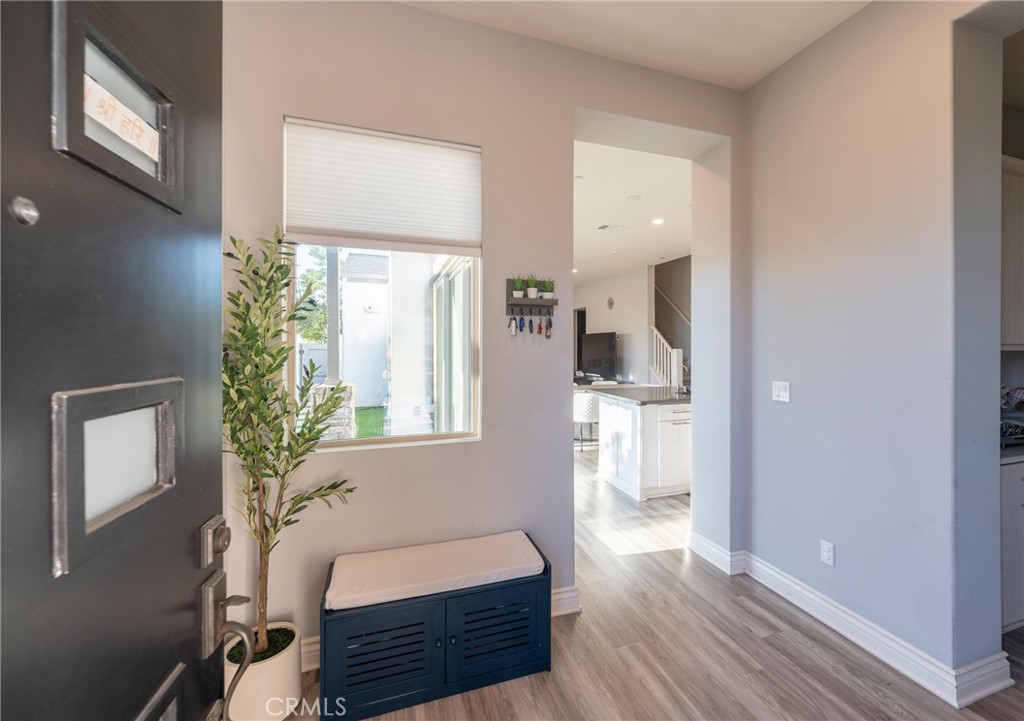 102 Spectacle Irvine, CA 92618 - Photo 5 of 40 a living room with furniture and a window