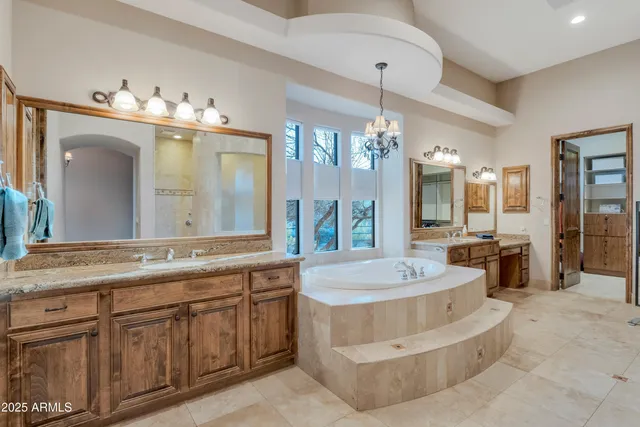 a bathroom with a granite countertop toilet sink and shower