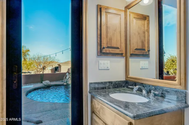 a view of a swimming pool with a sitting space