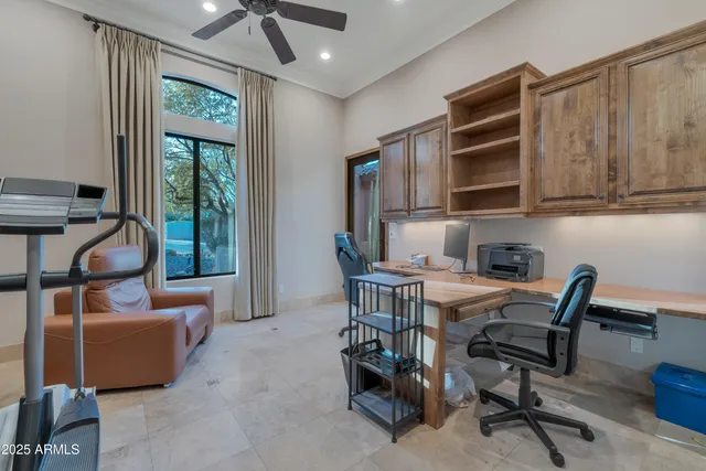 a view of a house with backyard porch and sitting area