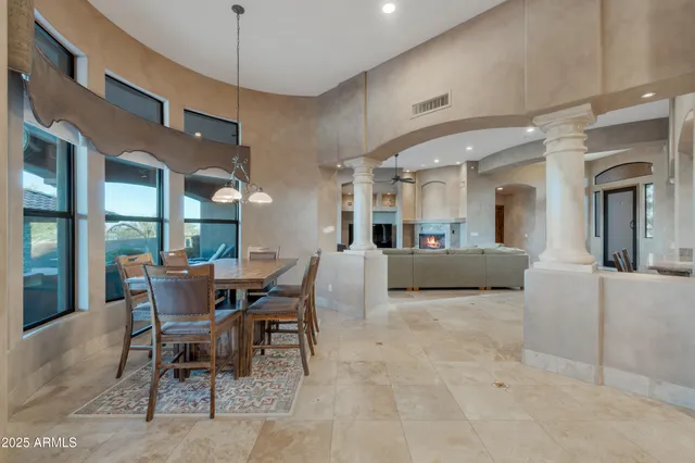 a stove top oven sitting inside of a kitchen