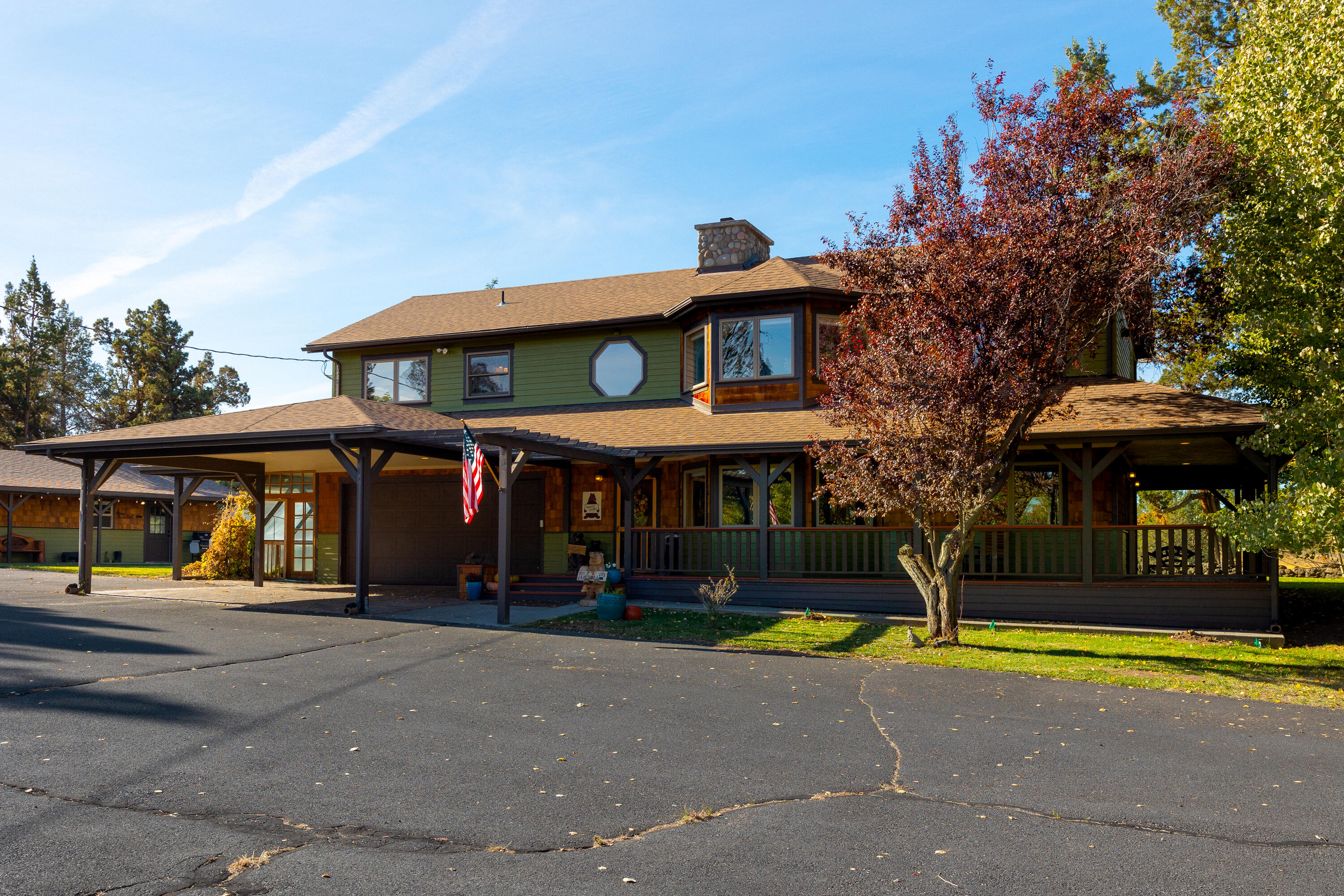 23321 Alfalfa Market Road Bend, OR 97701 - Photo 2 of 76 a view of a building with a garden