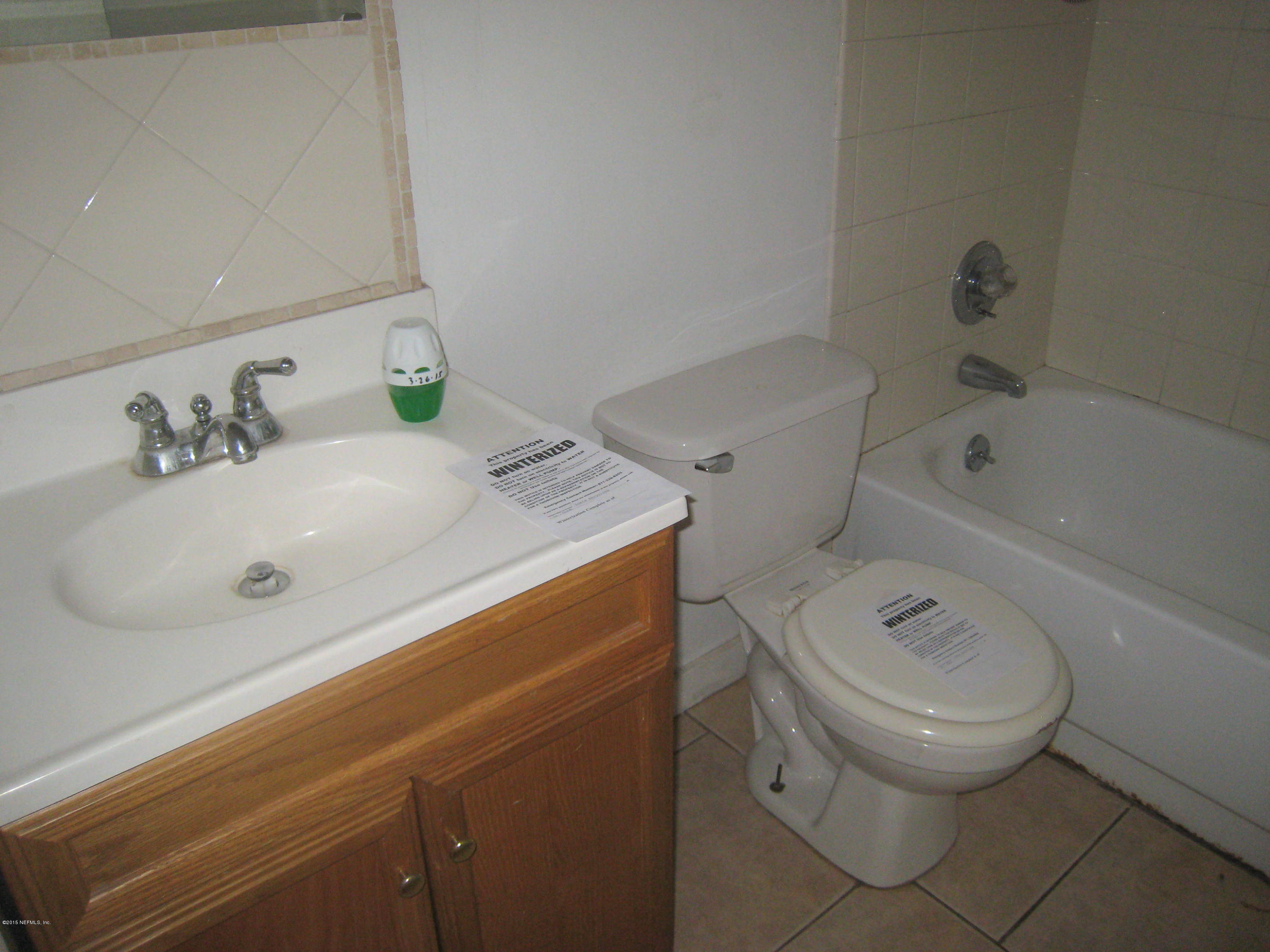 7539 Pheasant Path Drive Jacksonville, FL 32244 - Photo 9 of 19 hall bathroom